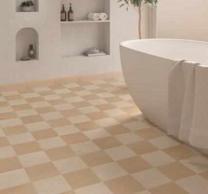 A checkerboard tile floor in shades of light tan and beige/cream. This pattern adds a classic, somewhat retro, but very warm and inviting feel to the room.