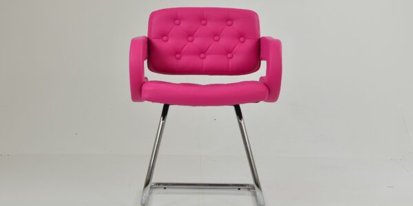 A modern Parga office chair featuring vibrant hot pink leather upholstery with button tufting and a sleek chrome sled-style base.