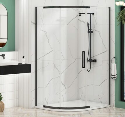 An offset quadrant shower enclosure with matt black frames and a single sliding door, installed in a modern bathroom. The enclosure features 8mm clear glass and is set against white marble-effect wall tiles.